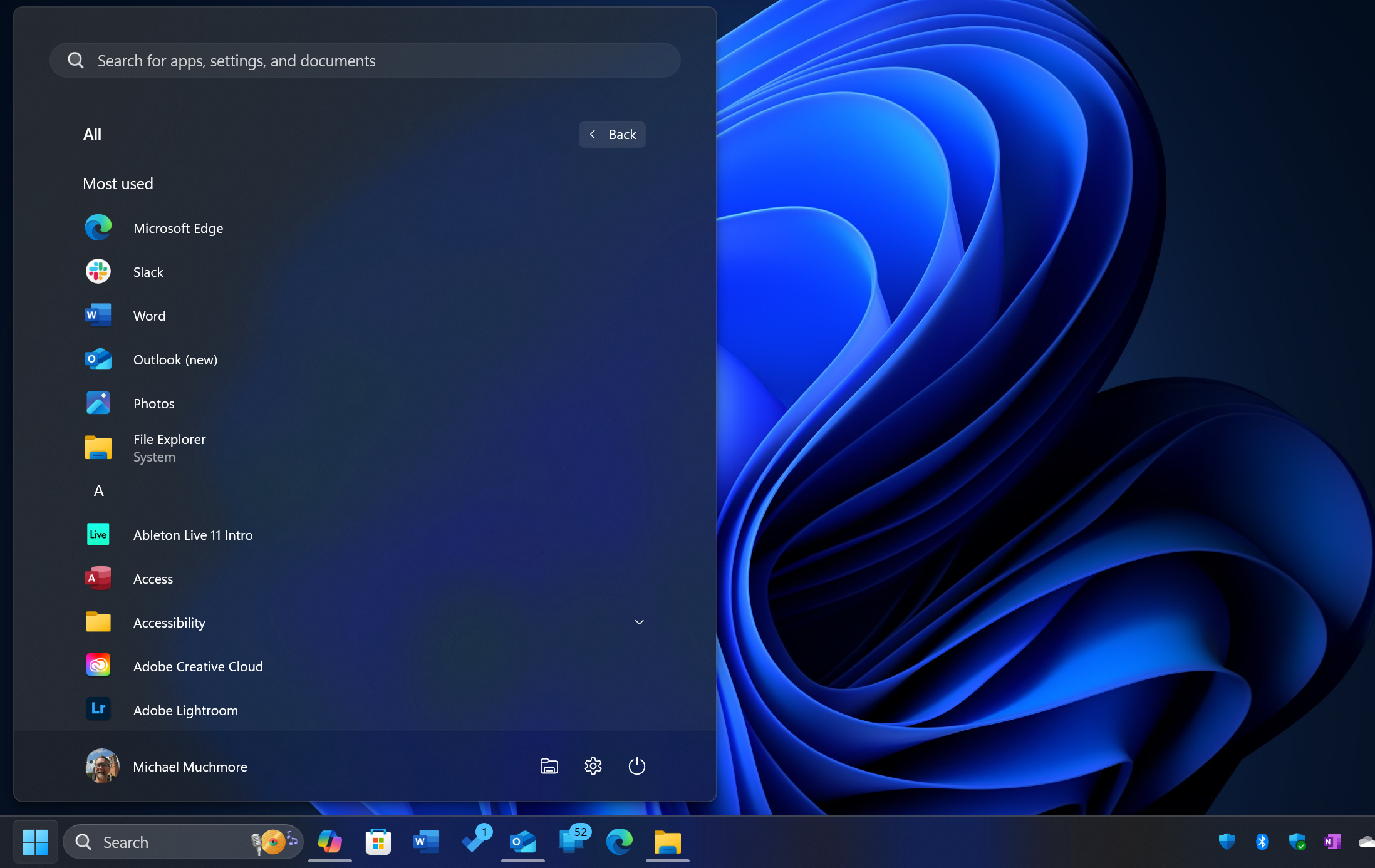 PC monitor waking from sleep mode showing a slow loading desktop and lagging applications on Windows 11